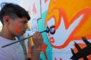 Chicos dejan su huella en el Mural de la Sarmiento