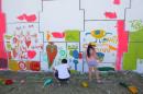 Chicos dejan su huella en el Mural de la Sarmiento